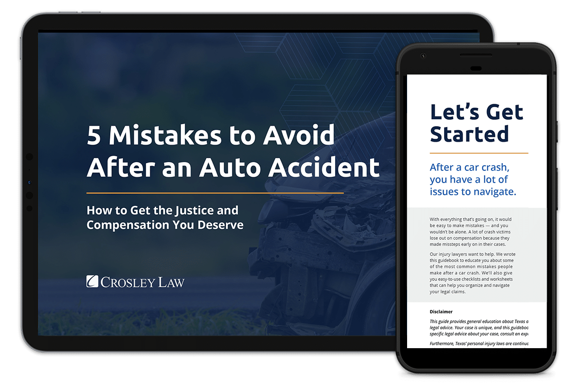 E-guides on a tablet and phone about avoiding mistakes after a truck accident.