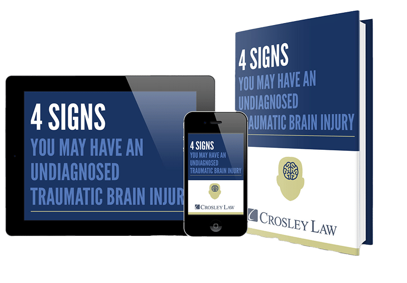 Promotional material with text "4 SIGNS YOU MAY HAVE AN UNDIAGNOSED TRAUMATIC BRAIN INJURY" displayed on devices.