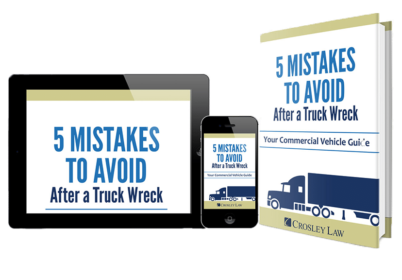 E-books and phone displaying "5 Mistakes to Avoid After a Truck Wreck"
