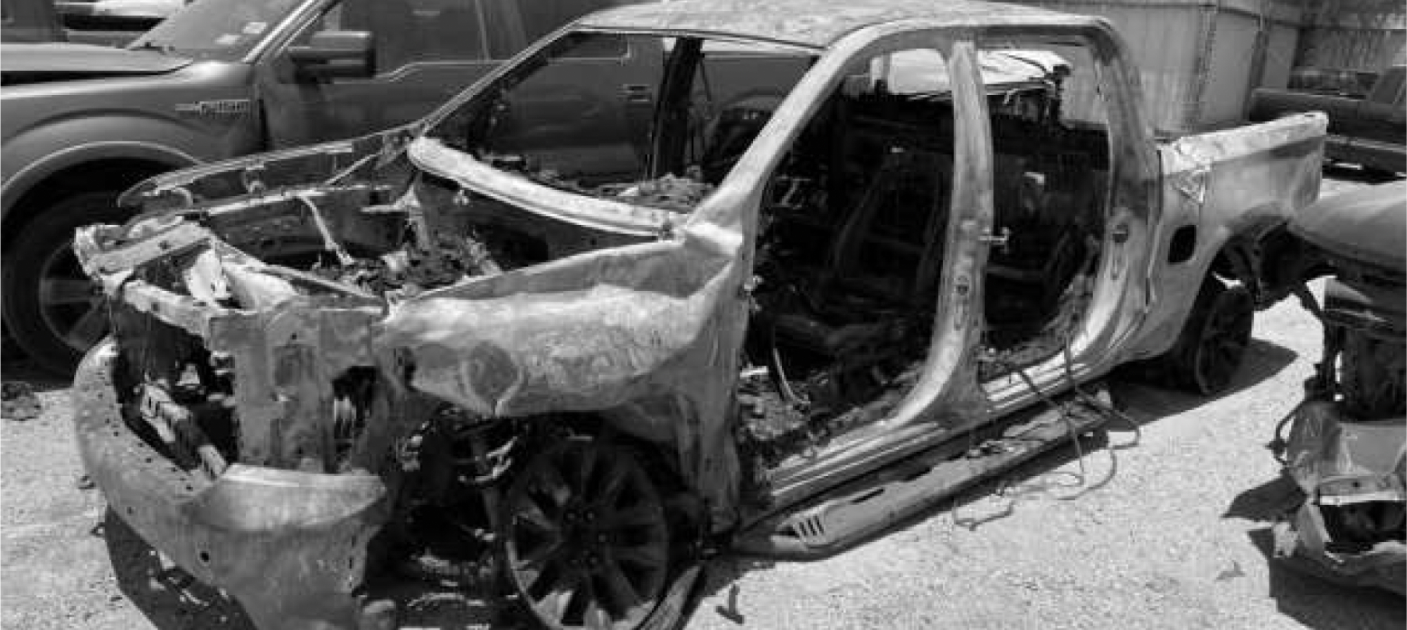A burned out car after a horrific accident