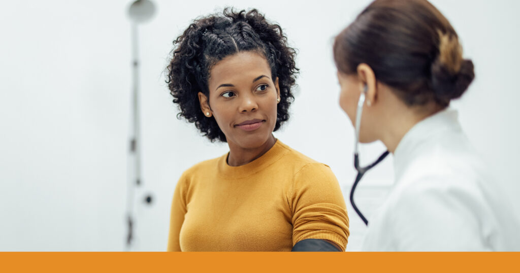 A woman consulting with a medical professional
