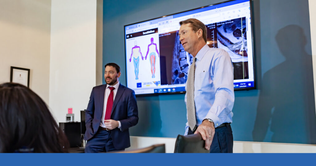 Attorneys Tom Crosley and Shawn Mechler conduct a presentation about a recent case.