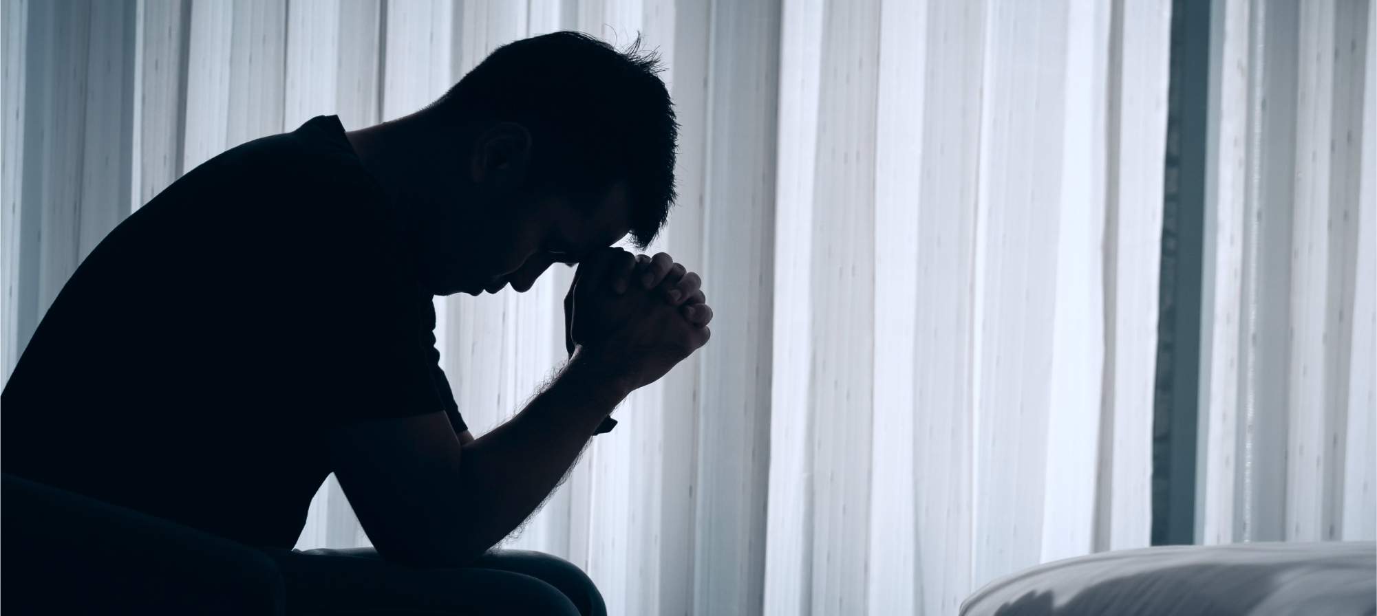 A family member grieves the loss of a loved one in a wrongful death incident.