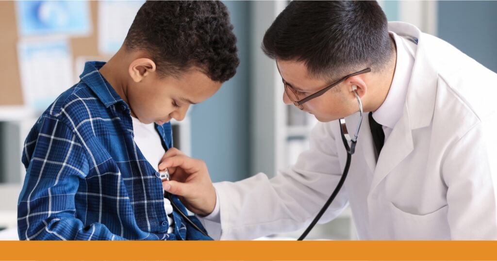 a doctor examining a child