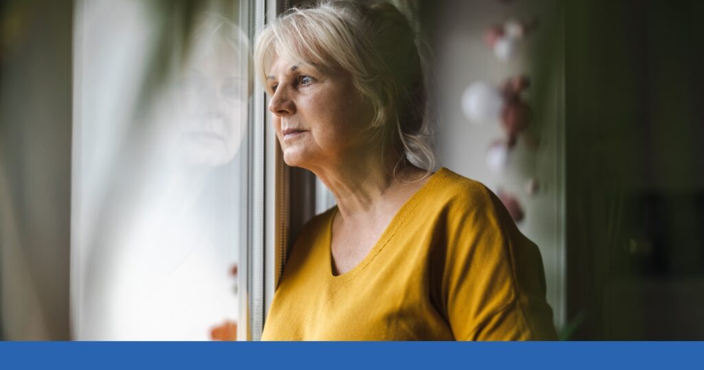 a woman looking out the window
