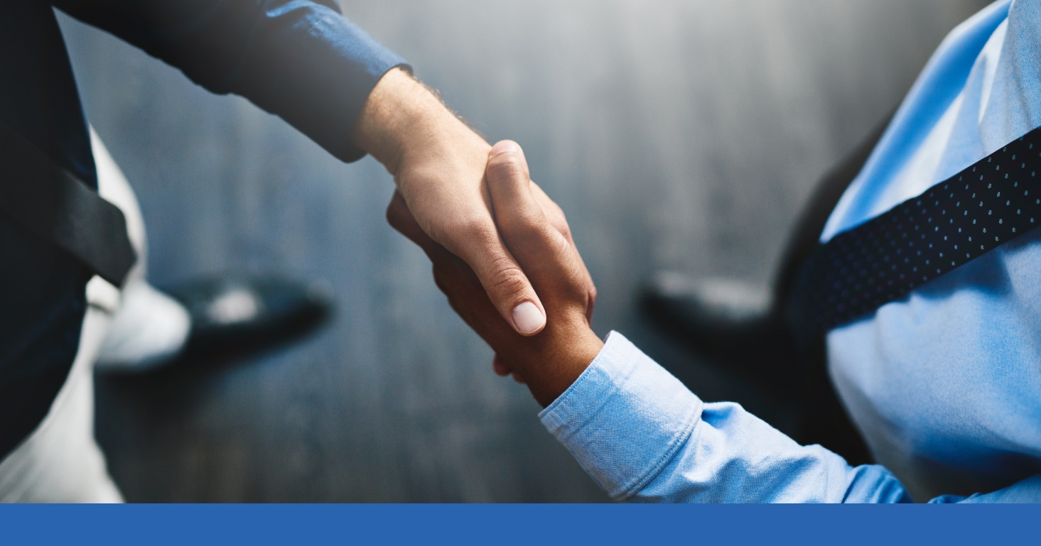 closeup of two people shaking hands