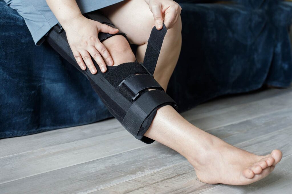 an injured leg in a brace after a personal injury accident