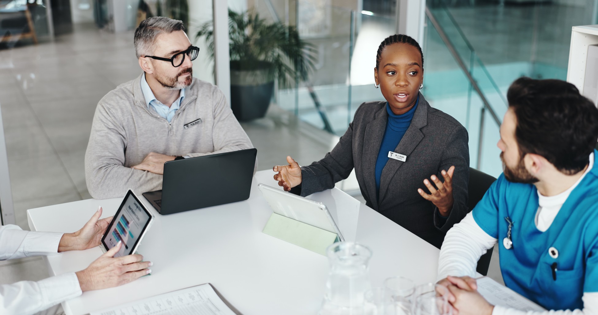 A San Antonio Truck Accident Lawyer Tells You What Insurance Companies Don't Want You to Know 2 Truck accident attorney consulting with medical expert and client during injury case review